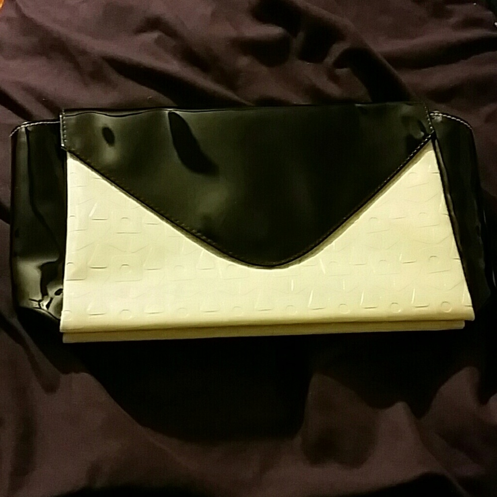 Never used black and white Clutch
